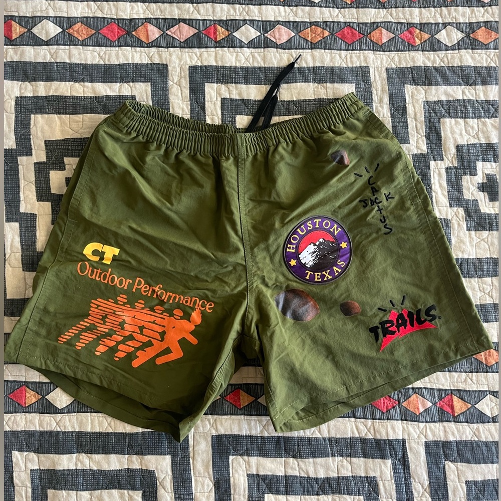 Cactus Jack by Travis Scott Olive Green Athletic Shorts with Orange Graphics